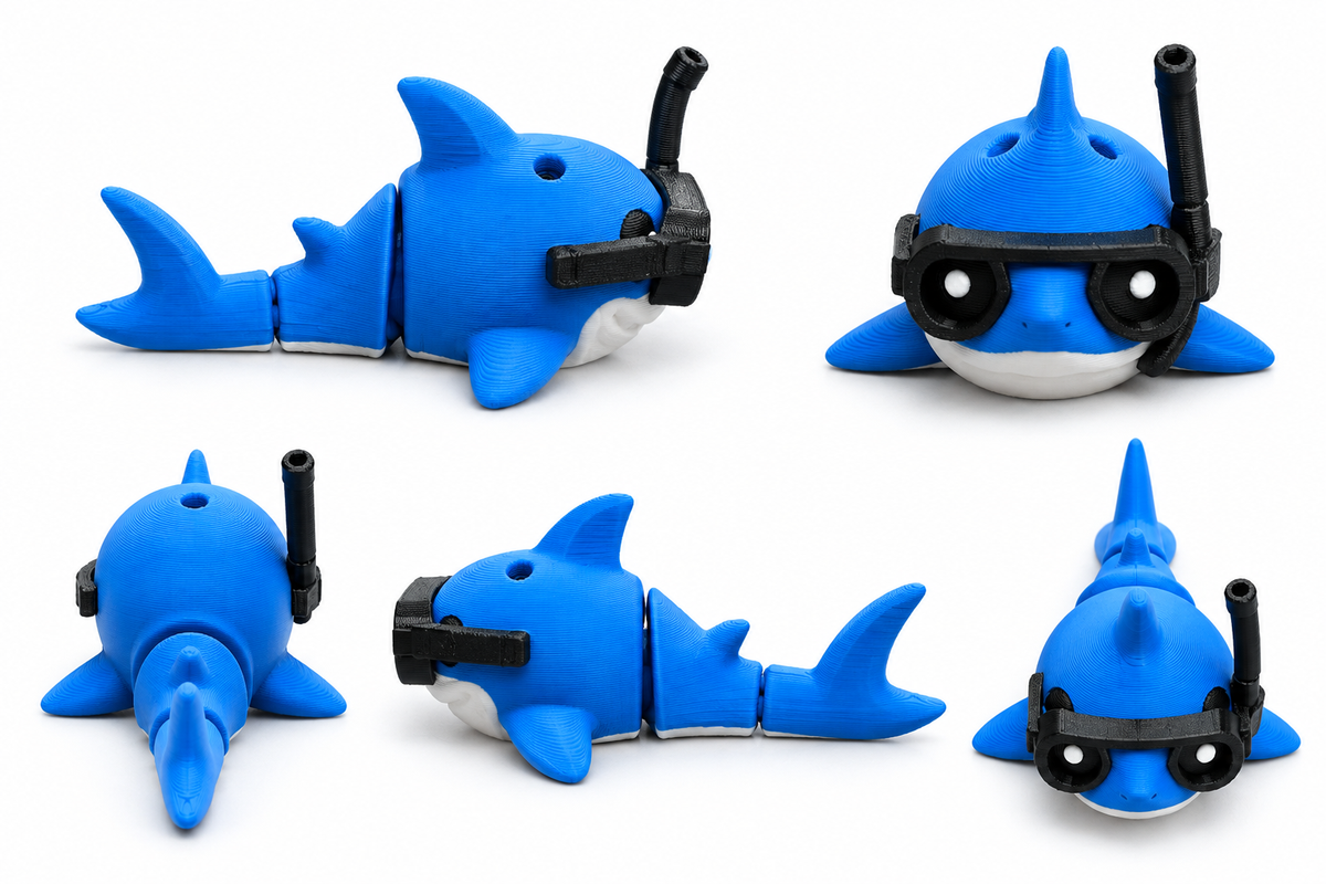 Blue 3D printed snorkel shark keychain on white background